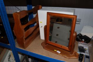 A pine magazine rack, a pine swing frame mirror, b