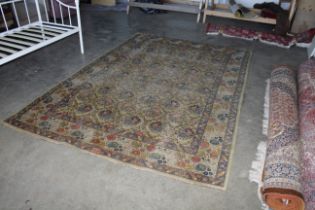 An approx. 9'10" x 7' floral patterned rug AF