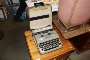 An Olivetti typewriter in carry case