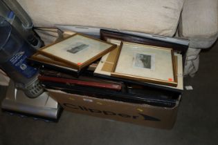 A box of various pictures and prints