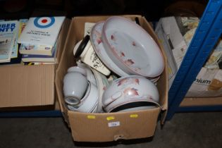 A box containing Denby dinnerware and other china