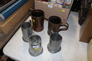 Three pewter tankards and two others