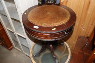 A circular mahogany and leatherette inset drum sha