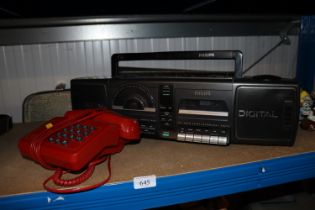A BT telephone and a Phillips radio/cassette playe