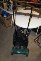 A Victor garden cylinder push mower