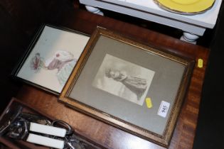 A framed sketch of a lady and a black and white ph
