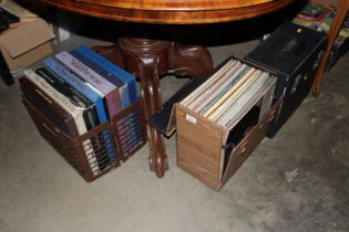 Two cases and a plastic crate of various records