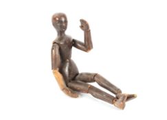 A 19th Century wooden artists lay mannequin, 34cm long