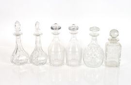 Two pairs of Victorian decanters; and two others