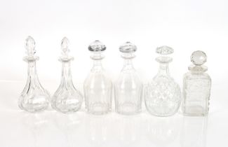 Two pairs of Victorian decanters; and two others