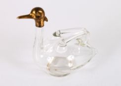 A vintage duck form claret jug, with stylised wing handles, the gilded brass spout stamped