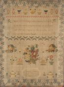 A 19th Century sampler, worked by Elizabeth Wilson, aged 11 years 1839, decorated flowers animals