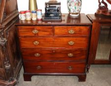 A 19th Century mahogany chest, fitted two short and three long graduated drawers raised on bracket