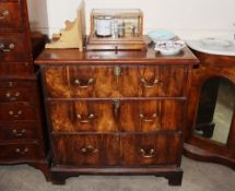 An 18th Century walnut chest, fitted three long drawers raised on bracket feet, 87cm wide x 54cm