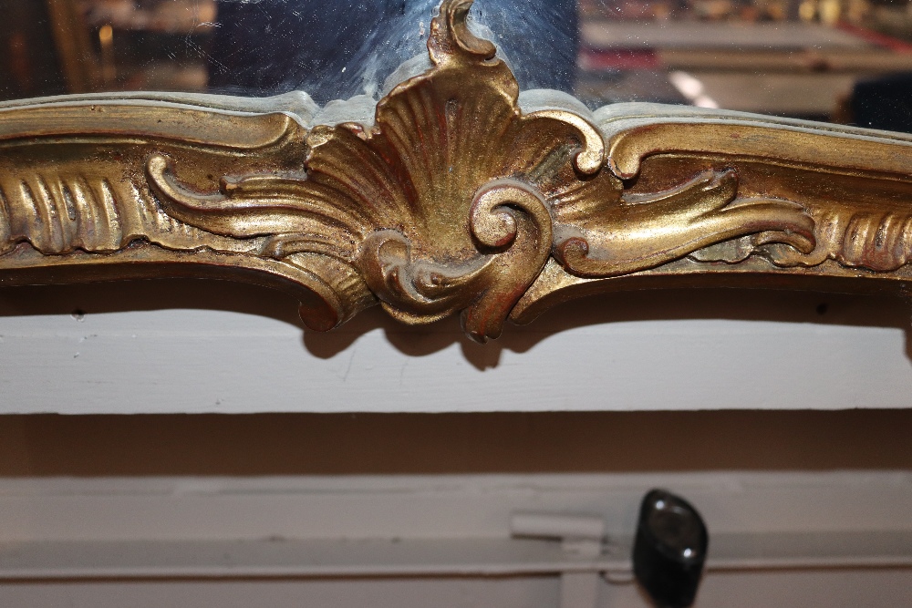 A pair of 19th Century impressive carved gilt wood wall mirrors of shaped rectangular form, - Bild 26 aus 26