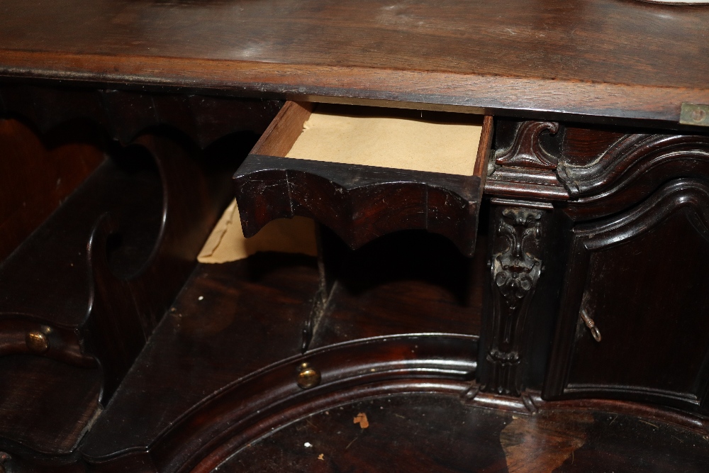 A large 19th Century continental carved rosewood bureau, the fall front opening to reveal an - Image 7 of 14