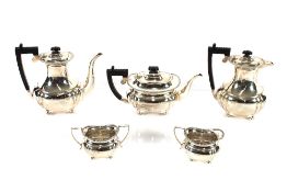 A 20th Century silver five piece tea and coffee set, of baluster form with black wood  handles and