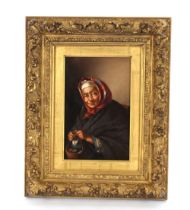 19th Century continental school, peasant woman wearing a headscarf, oil on canvas in gilt frame,