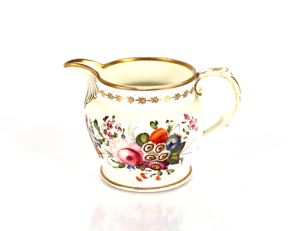 A possibly Swansea Welsh porcelain early 19th Century jug, with finely painted foliate decoration