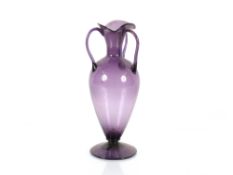 An Arts & Crafts style amethyst glass vase, flared