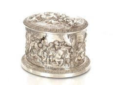 A 19th Century white metal hinged box, possibly by Asprey & Co., richly embossed with an allegorical