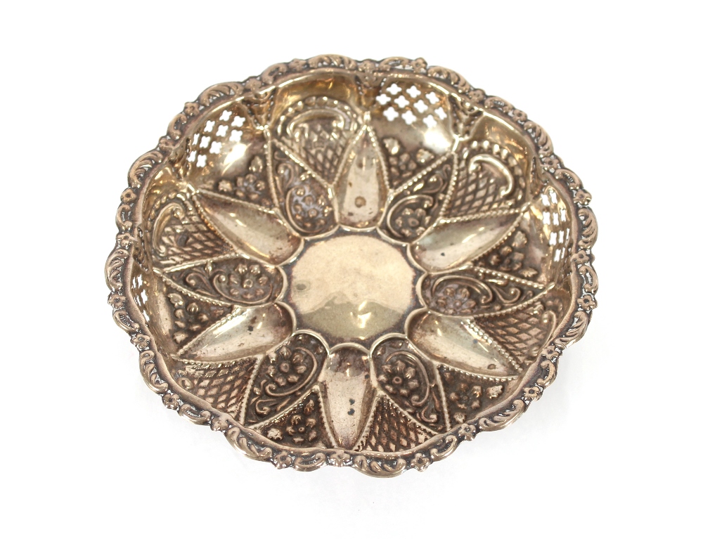 A small copper lidded bowl with handle; various copper moulds; a miniature copper jug; and a pierced - Image 3 of 4