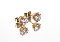 A pair of 9ct gold and white stone set stud ear-ri