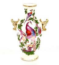 A Chelsea porcelain baluster vase, decorated birds and foliage flanked by gilt heightened floral