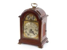 A 19th Century mantel clock, with chiming movement having brass spandrel dial and steel chapter