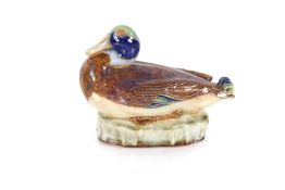 A Royal Doulton stoneware model of a seated duck, impressed to base H.S. No. 539, 18cm long x 14cm