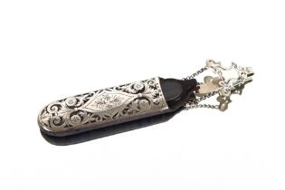 A silver and foliate engraved spectacle case, with suspension belt hook by George Unite,