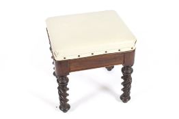 A Victorian mahogany framed dressing stool, raised on spiral turned column supports, leatherette