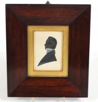 A pair of Victorian silhouettes, in original rosewood frames, 10.5cm x 7.5cm, 25cm x 23cm overall