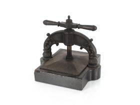 A Victorian cast iron book press