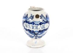 A fine London Delft wet drug jar circa 1700, of generous baluster shape raised on a spread foot with