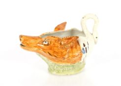 An early 19th Century Pratt ware jug, in the form of a fox and goose, 15cm AF