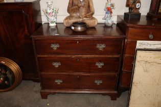 A George III mahogany chest of three long drawers, raised on bracket feet, 95cm wide x 54cm deep x