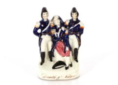 A rare mid 19th Century Staffordshire group "Death of Nelson", 20cm high