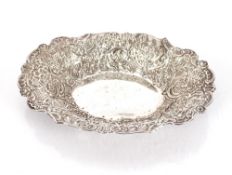 A Victorian silver bon bon dish, with Repoussé decoration by William Comyns, London 1891; and a