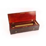 A Swiss music box by Le Coultre, playing six airs in rosewood and satin wood strung case, 13"
