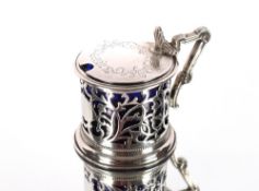 A large Victorian silver pierced drum shaped mustard, vacant cartouche to front, engraved decoration