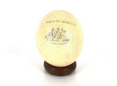 An Ostrich egg with scrimshawed ship decoration inscribed Poldark Yarmouth "Tall Ships Race"