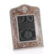 A fine quality regimental ornate frame with badge to top