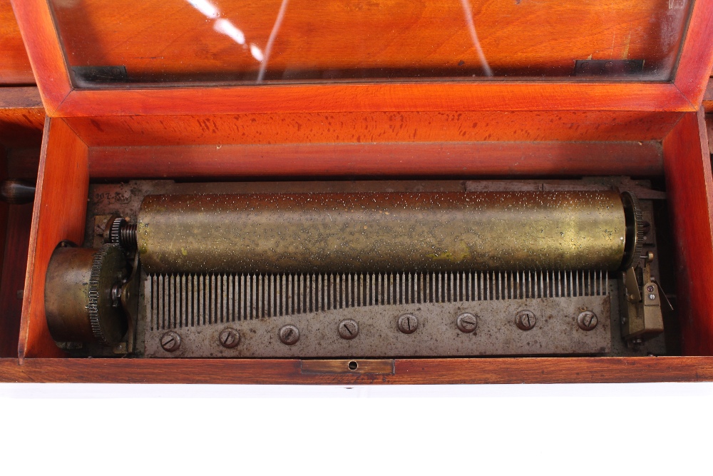 An early Victorian music box, playing six airs in rosewood and cross banded case, 12" cylinder - Image 3 of 4