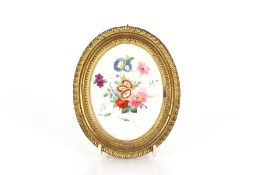 A 19th Century oval Davenport porcelain plaque, decorated flowers in gilt frame, 15cm  x12.5cm