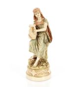 A late 19th Century Austrian Royal Dux porcelain figure of an Eastern Maiden, pink triangle mark