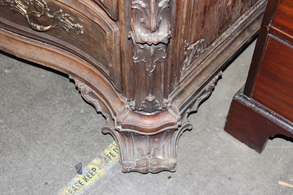 A large 19th Century continental carved rosewood bureau, the fall front opening to reveal an - Image 13 of 14