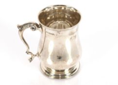 A mid-20th Century silver baluster tankard, having acanthus scroll handle, Chester 1944, 13cm