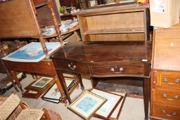 A reproduction mahogany bow fronted side table fit