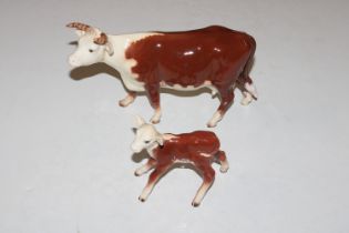 A Beswick model of a Hereford cow and calf AF and restored